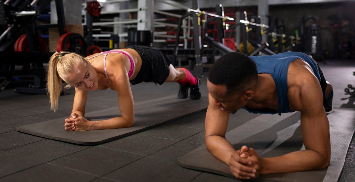 people training together on yoga mats